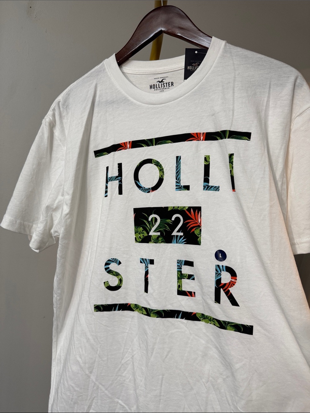 Hollister White Tee with Tropical Multicolor Logo